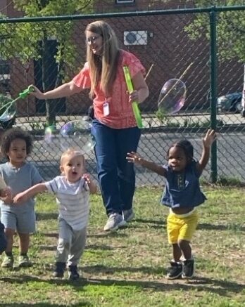 Children playing outdoors at St. James Preparatory Academy